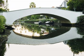 Bridge Reflecting In Water, Venice Beach, California by Panoramic Images art print