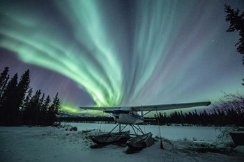 Northern Lights Above a Plane at Night by Jonathan Tucker/Stocktrek Images art print