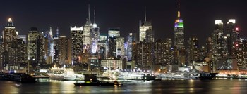 Buildings in a city lit up at night, Hudson River, Midtown Manhattan, Manhattan, New York City, New York State, USA by Panoramic Images art print