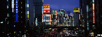 Buildings lit up at night, Shinjuku Ward, Tokyo Prefecture, Kanto Region, Japan by Panoramic Images art print
