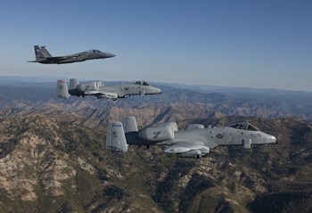 F-15 Eagle and Two A-10 Thunderbolts, Central Idaho by HIGH-G Productions/Stocktrek Images art print