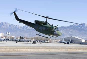 UH-1N Twin Huey near Kirtland Air Force Base, New Mexico by HIGH-G Productions/Stocktrek Images art print