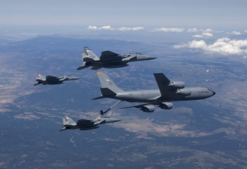 KC-135R Stratotanker RefuelsTthree F-15 Eagles by HIGH-G Productions/Stocktrek Images art print