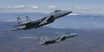 Two F-15 Eagles Training over Oregon by HIGH-G Productions/Stocktrek Images art print