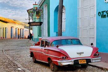 Colorful buildings and 1958 Chevrolet Biscayne, Trinidad, Cuba by Adam Jones / Danita Delimont art print