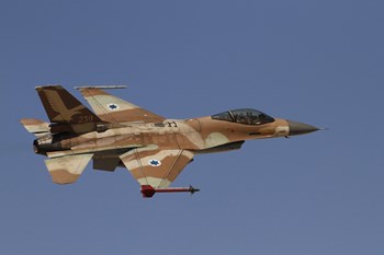 An F-16A Netz of the Israeli Air Force in flight over Israel by Ofer Zidon/Stocktrek Images art print