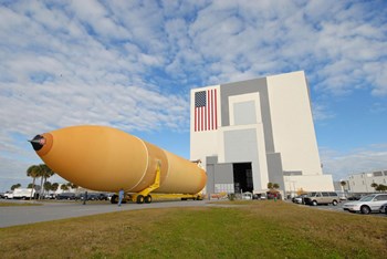 External Tank 130 Rolls Toward Kennedy Space Center&#39;s Vehicle Assembly Building by Stocktrek Images art print