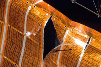 Close-up of a Tear in Solar Array Material on the International Space Station by Stocktrek Images art print