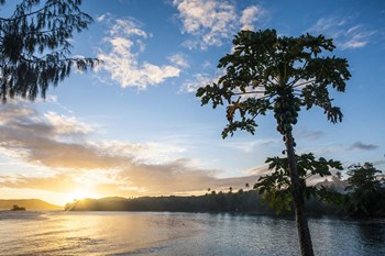 Sunset over the beach of resort, Nacula Island, Yasawa, Fiji, South Pacific by Michael Runkel / DanitaDelimont art print