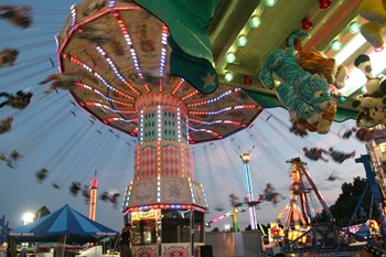 County Fair Flying Chairs by Robert Goldwitz art print